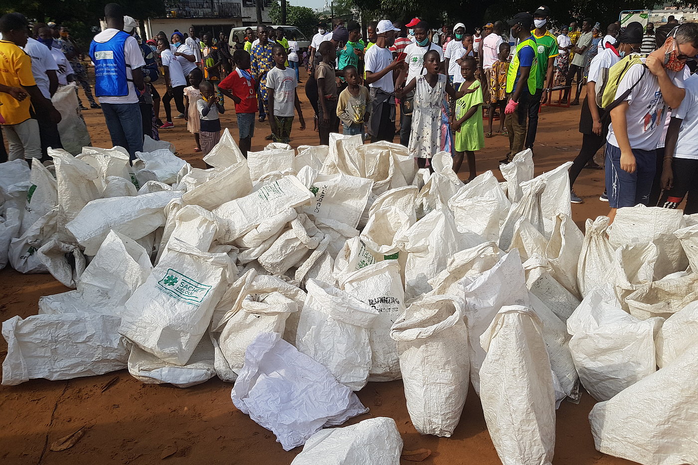 Photo: White rubbish bags piled up together