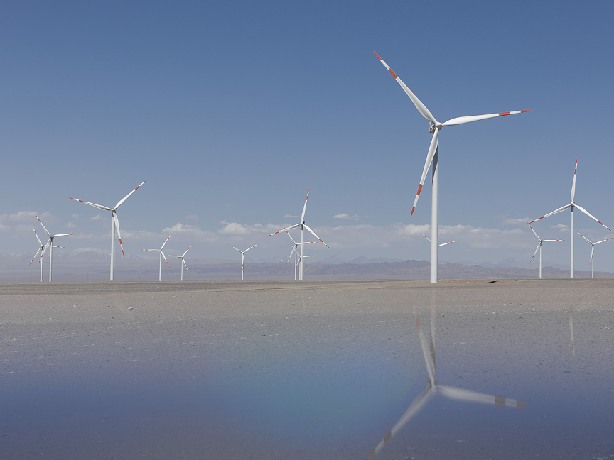 A wind farm with numerous wind turbines in Chile’s Atacama Desert.